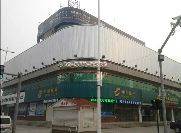 山東濱州博興郵政局弧形轉(zhuǎn)角三面翻廣告牌案例施工圖片