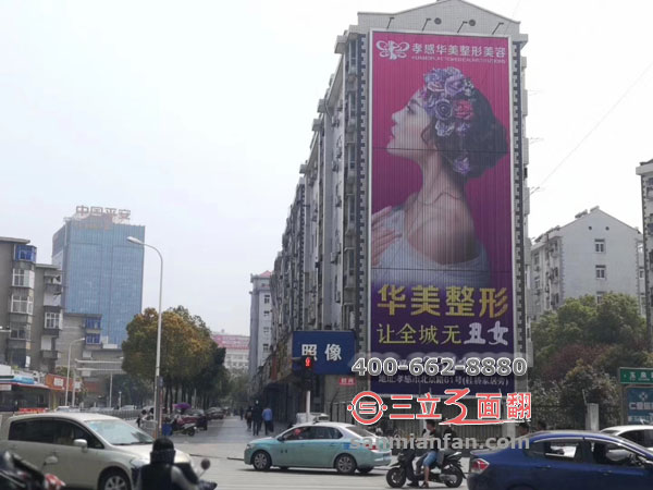 湖北省孝感市樓體拼接超高分段三面翻廣告牌案例施工圖片