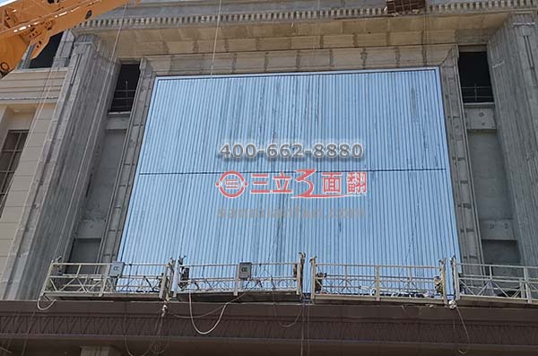 山東煙臺(tái)萊陽(yáng)市墻體分段三面翻超高廣告牌案例施工圖片